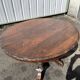 Table de chasse ovale en chêne sculpté style XIX e aux dragons