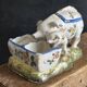 Antique earthenware pig box, salt cellar or mustard pot, floral decoration.
