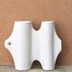 Sgrafo Modern sculptural white porcelain vase by Peter Muller