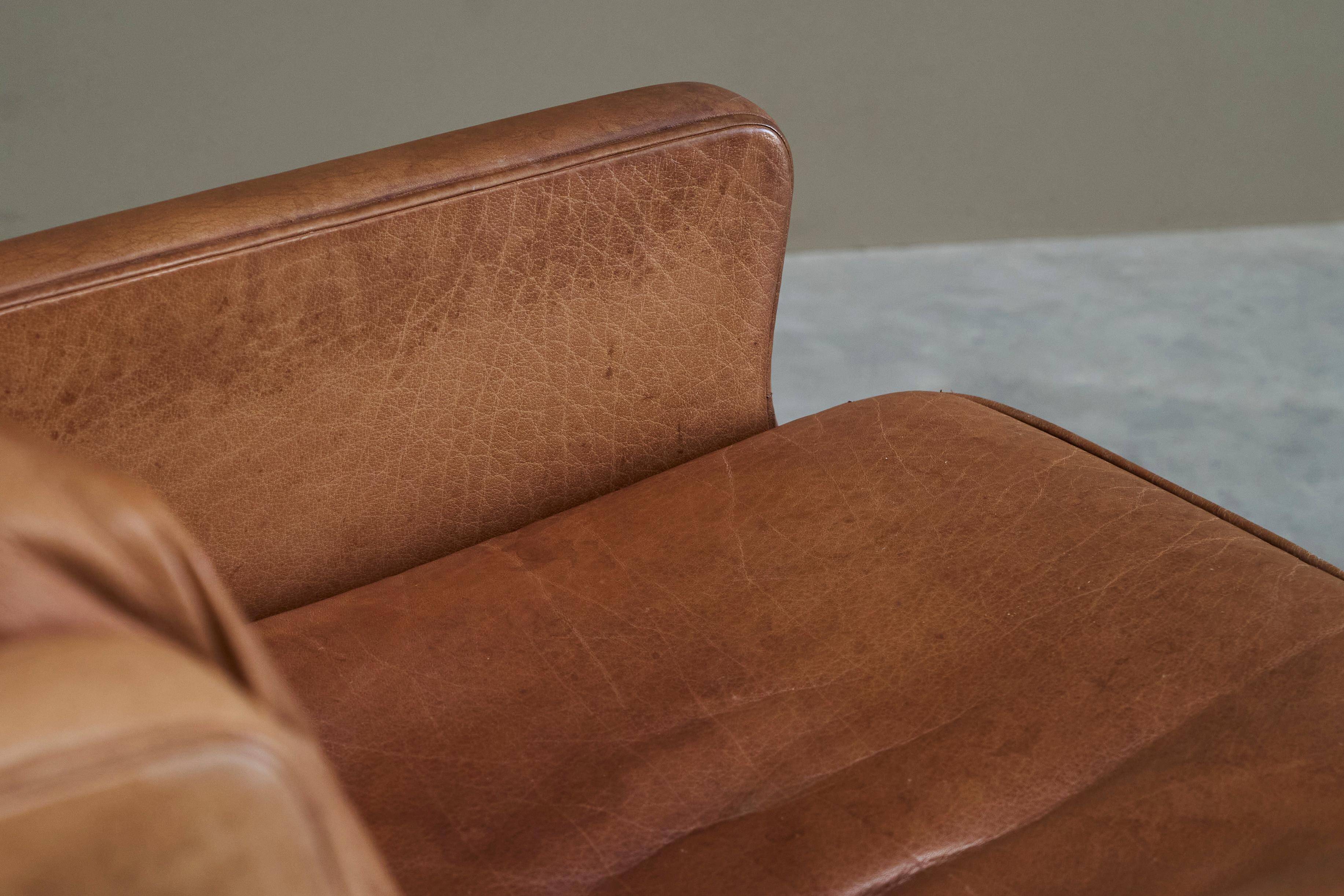 1970s patinated leather Scandinavian lounge chair