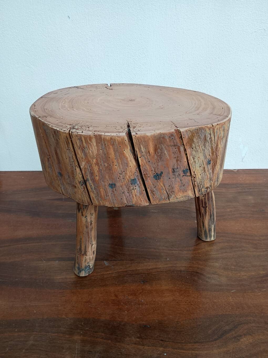 Brutalist tripod coffee table in solid wood.
