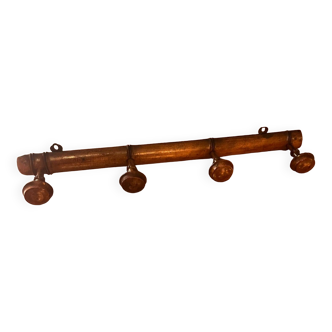 Old wooden wall coat rack