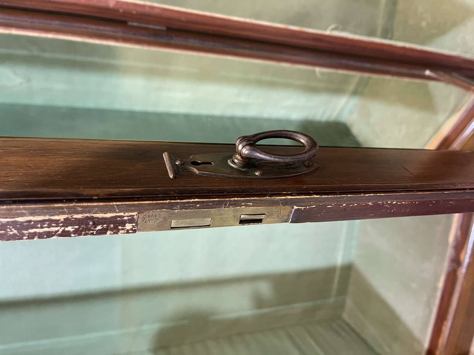 19th-century English mahogany three-door wardrobe.