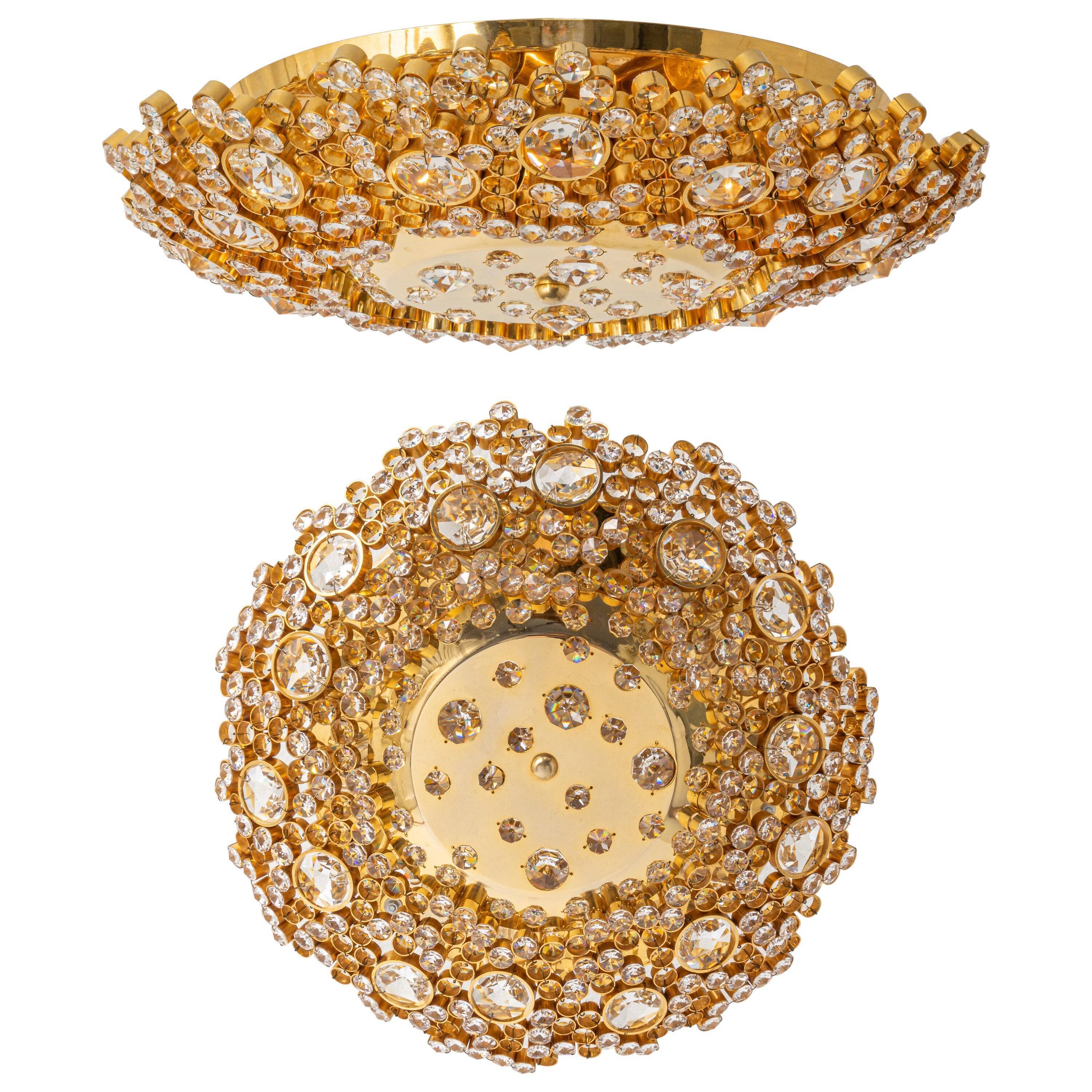 Floral wall light in gilded brass and cut glass by Palwa, Germany, 1970s.