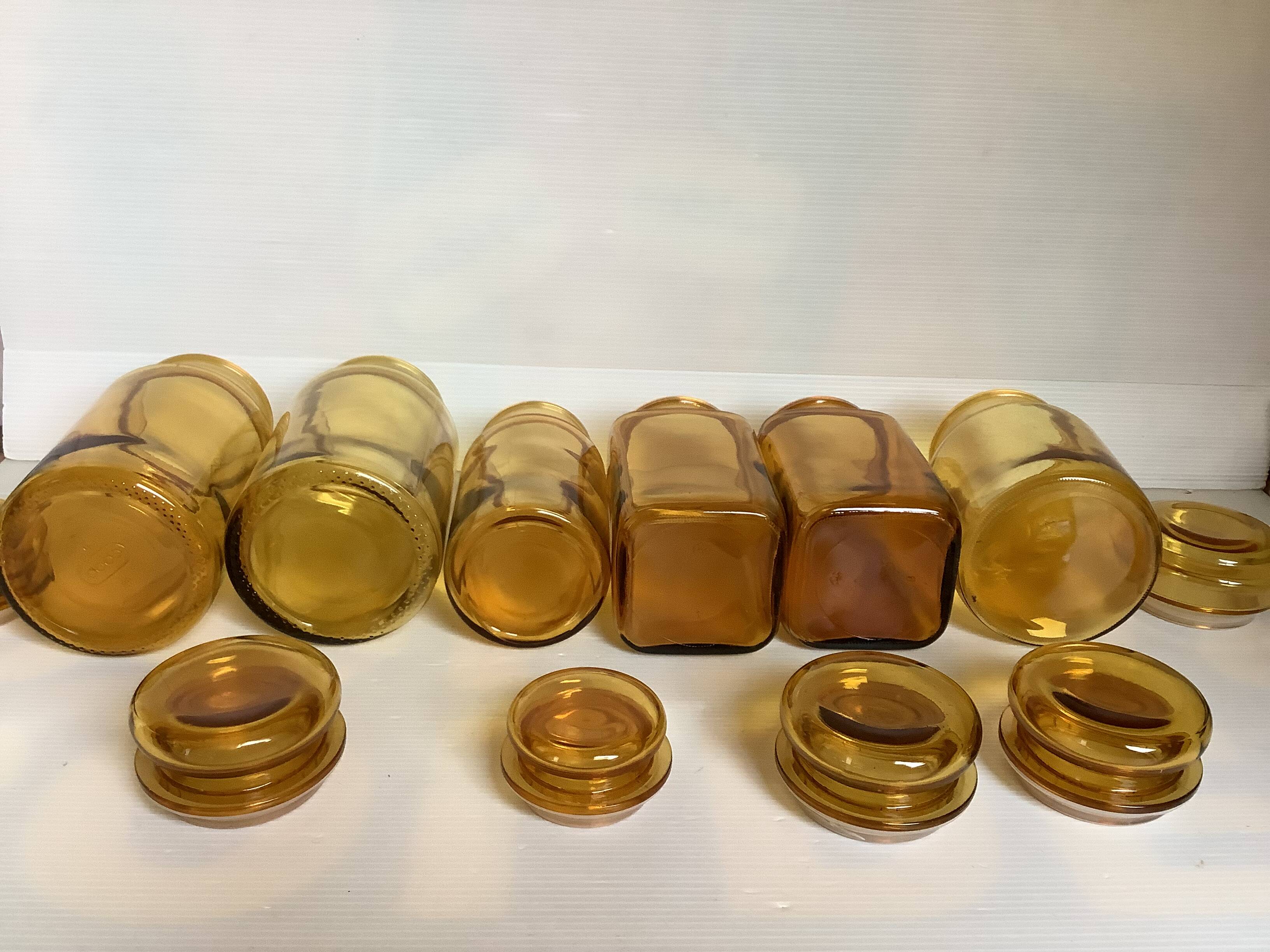 Six yellow glass candy jars from the 70s