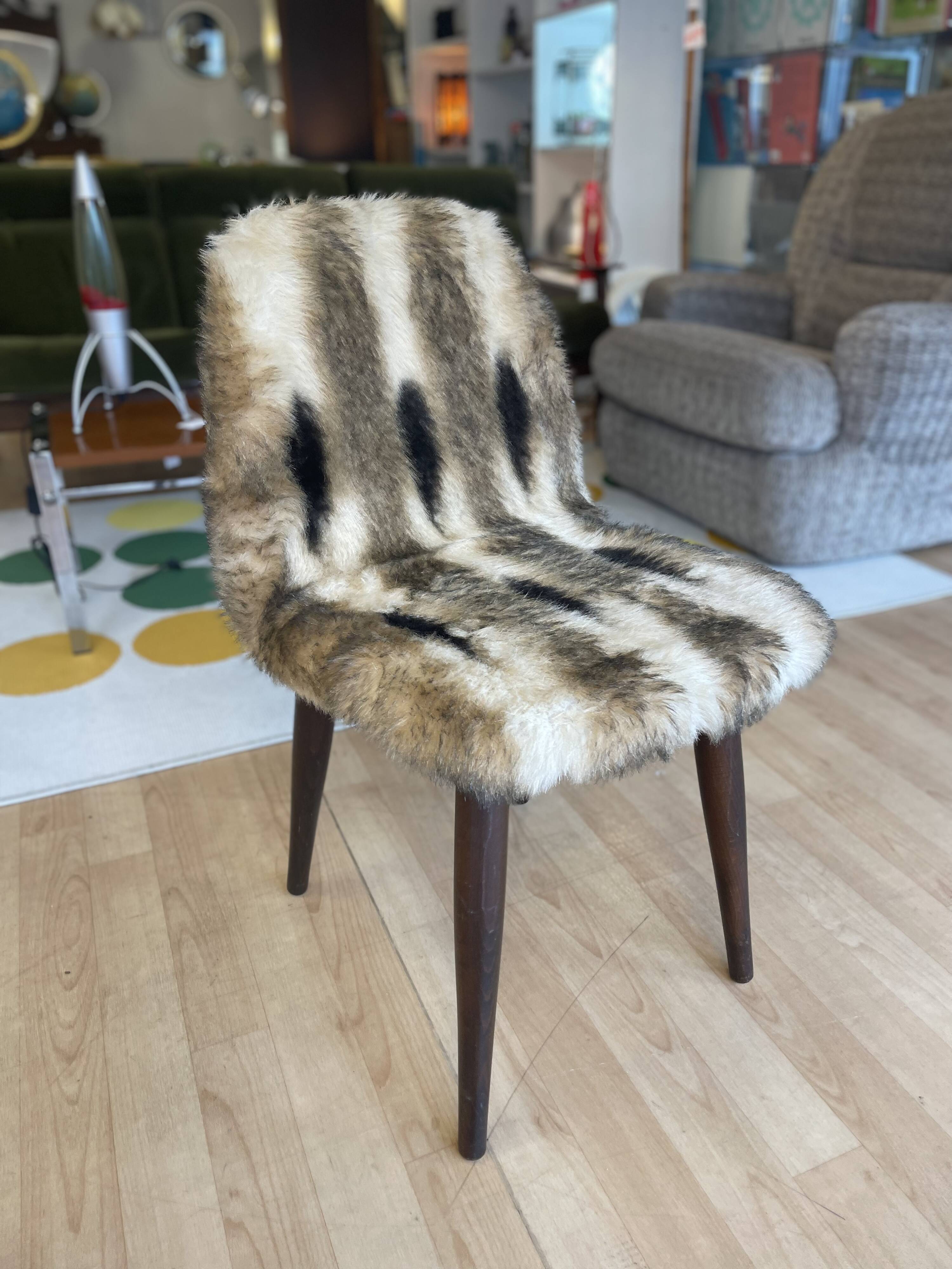 Faux fur chair with patterns & tapered dark wood legs