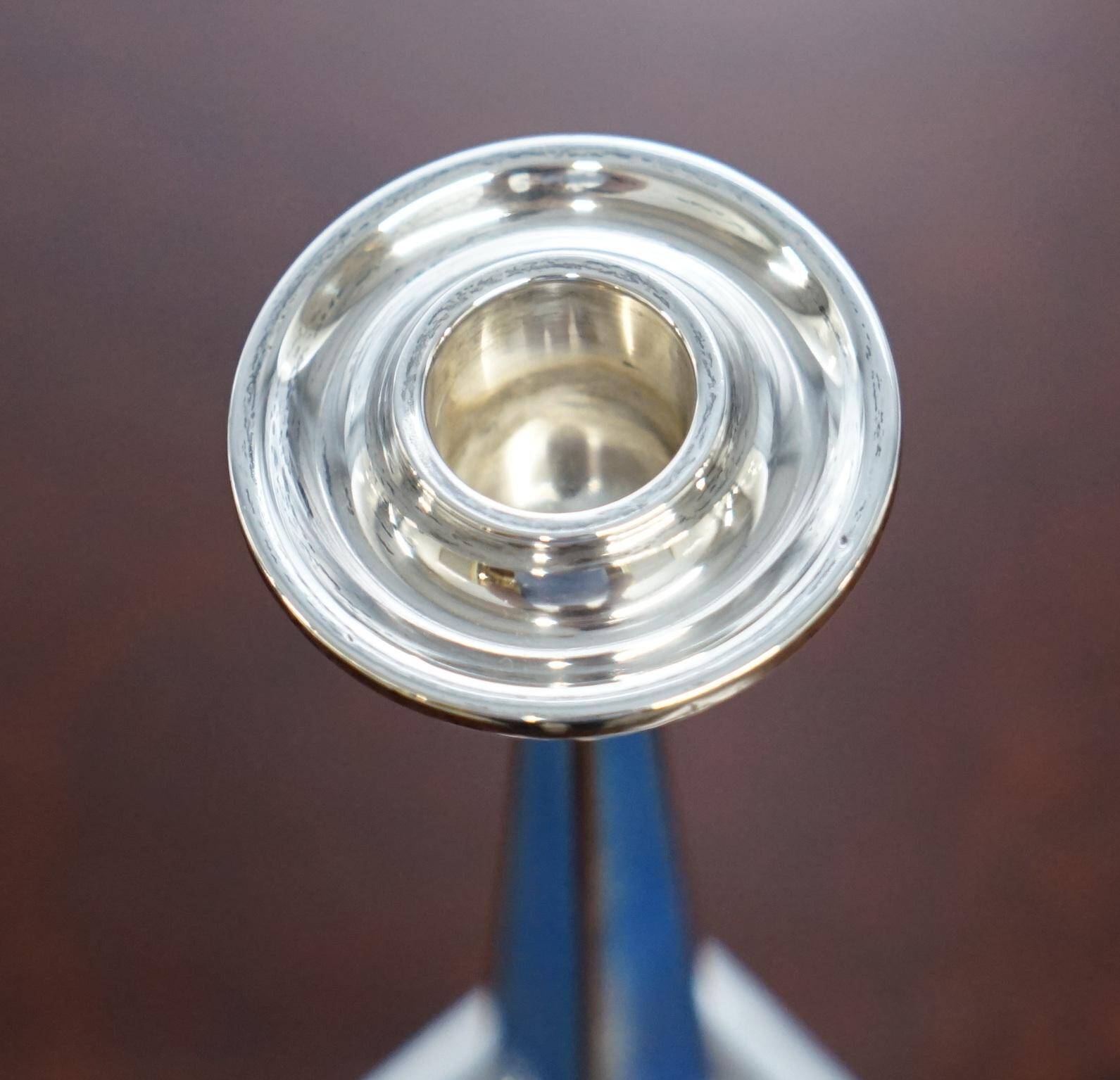 Pair of sterling silver and enamel candlesticks 1927 by Charles Green & Co.