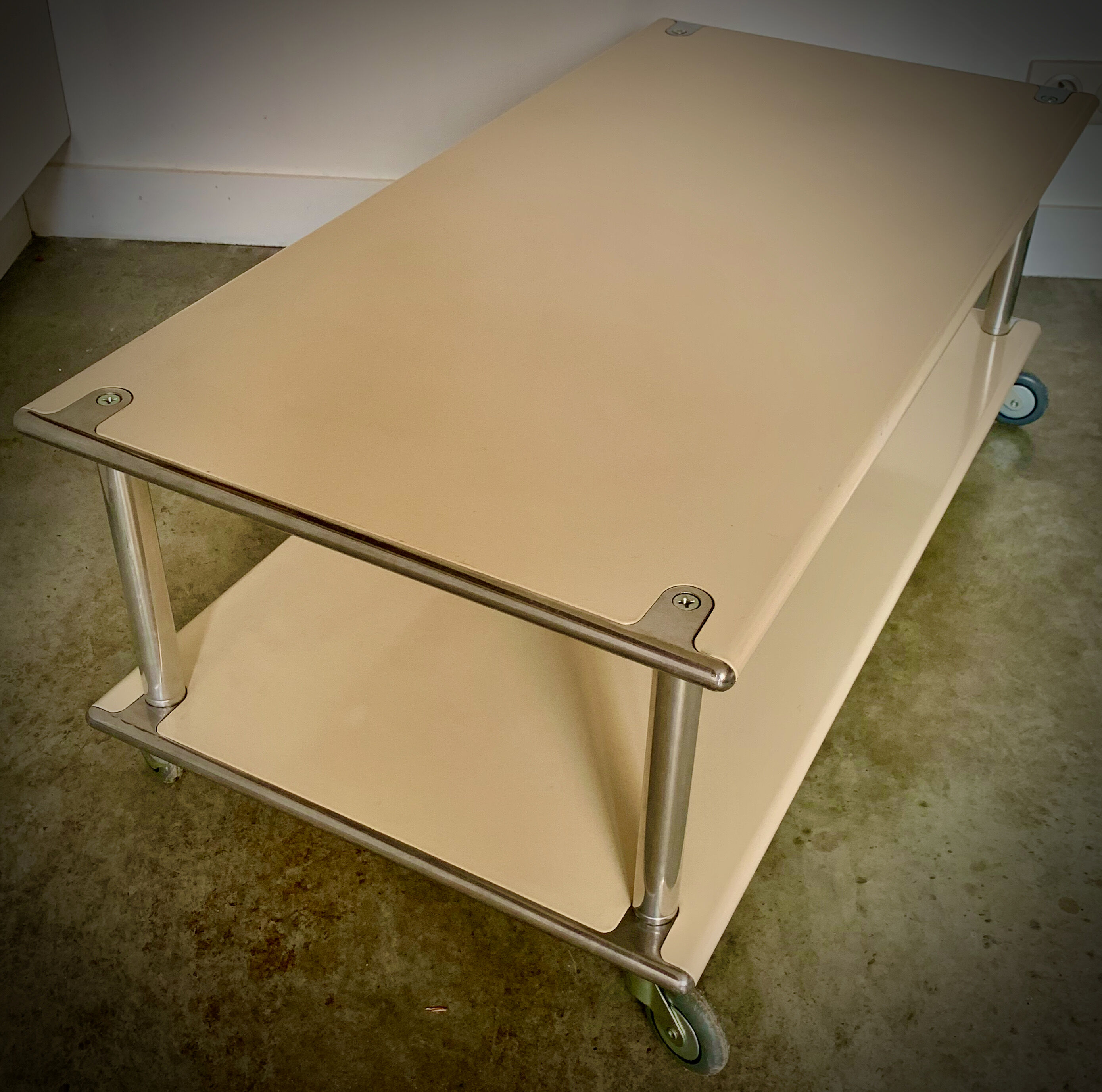 Modernist coffee table - airplane wing - in lase plate and brushed aluminium