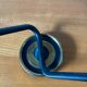 Vintage brass and black double arm wall lamp