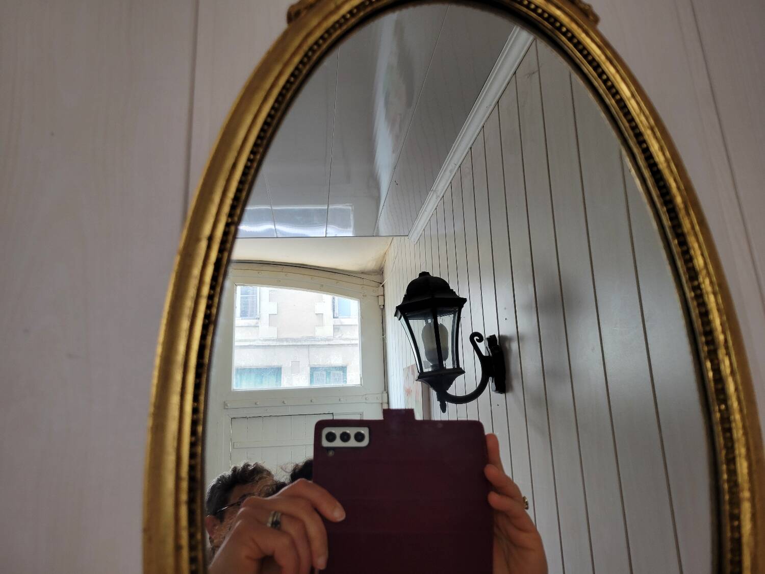 Louis XVI style oval mirror