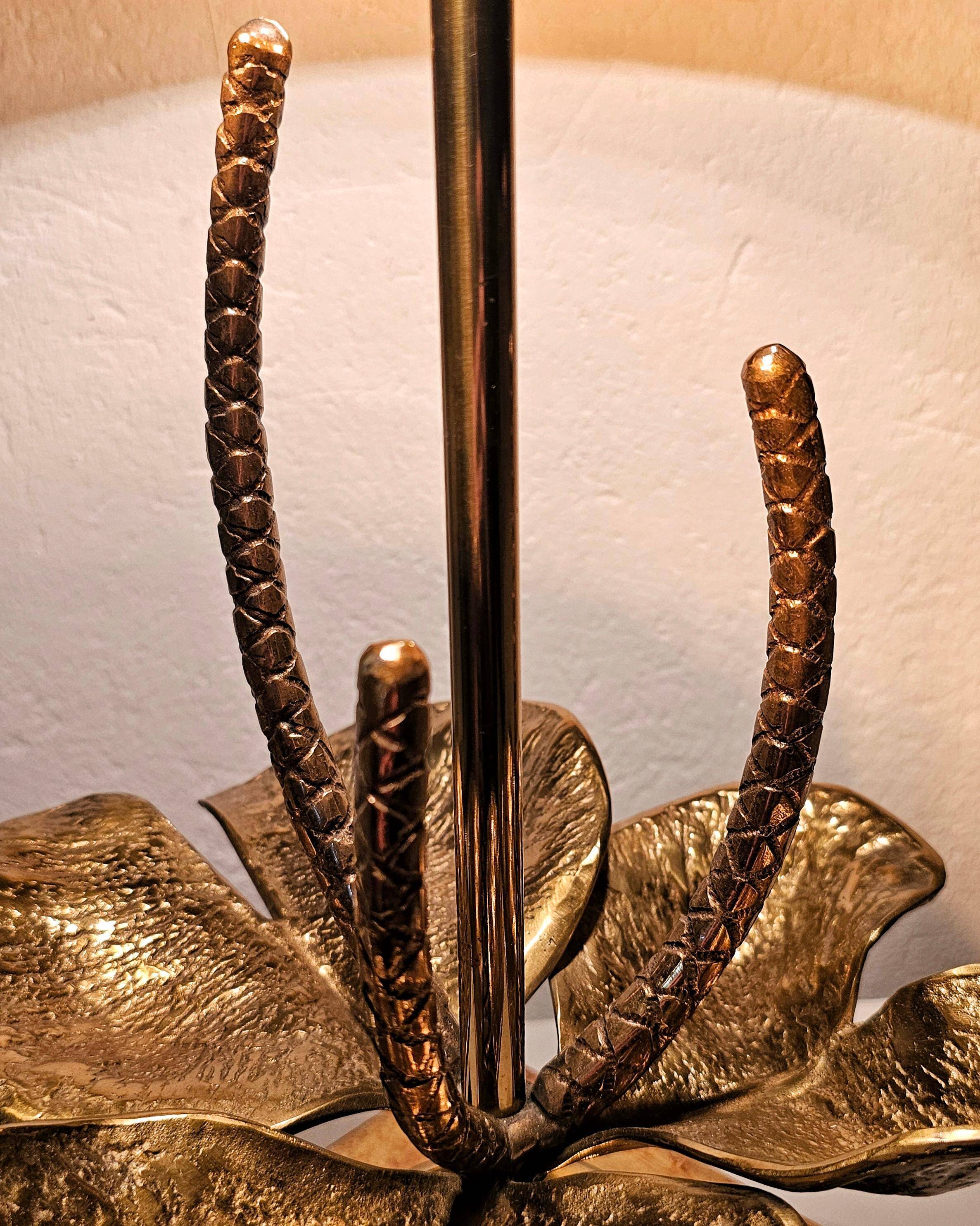 Nenuphar table lamp in bronze and brass by Maison Charles, 1960s.