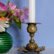 Antique carved bronze candlestick