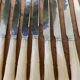 Series of 12 vintage table knives
