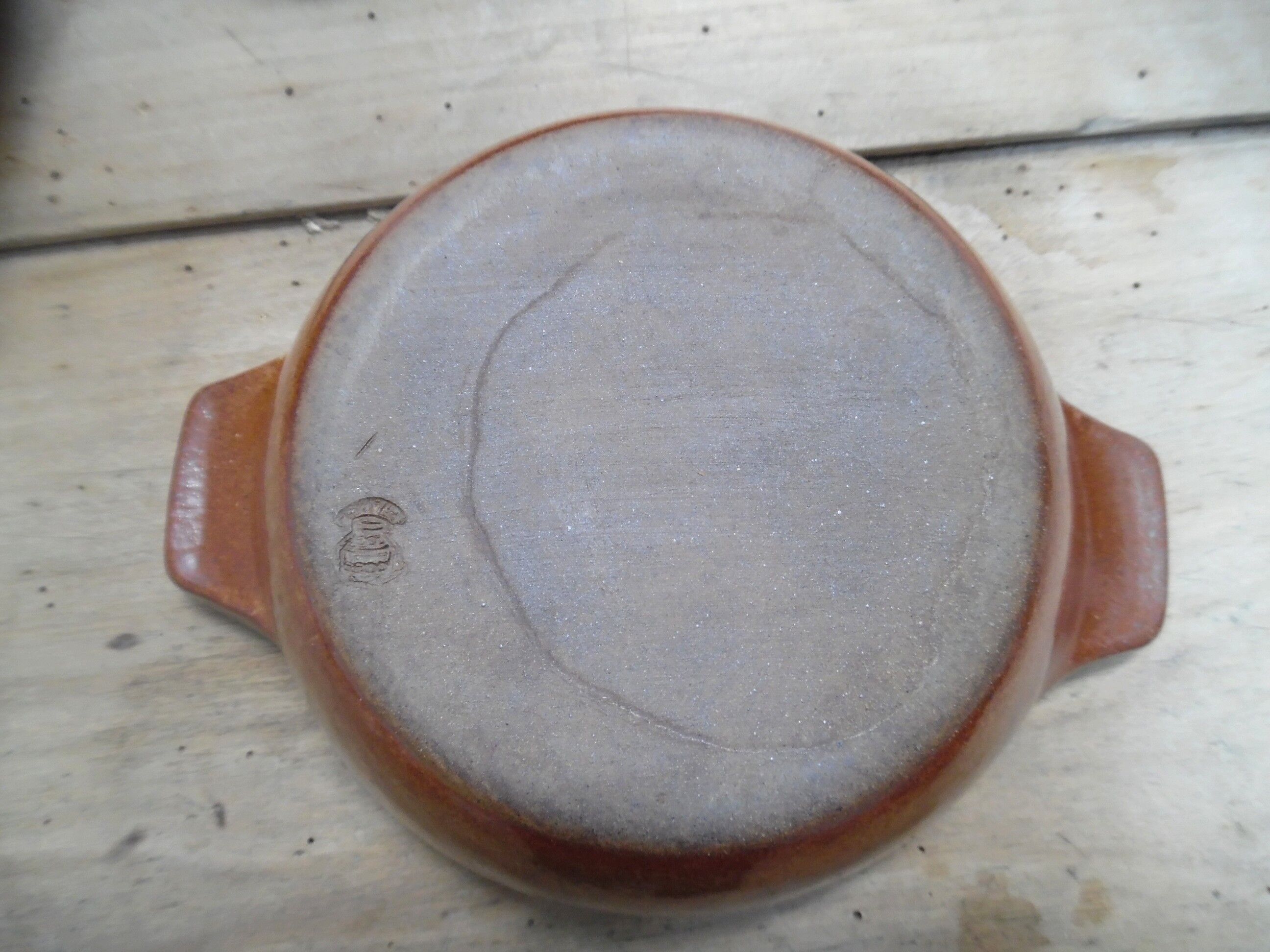 Set of soup plates to ears in sandstone