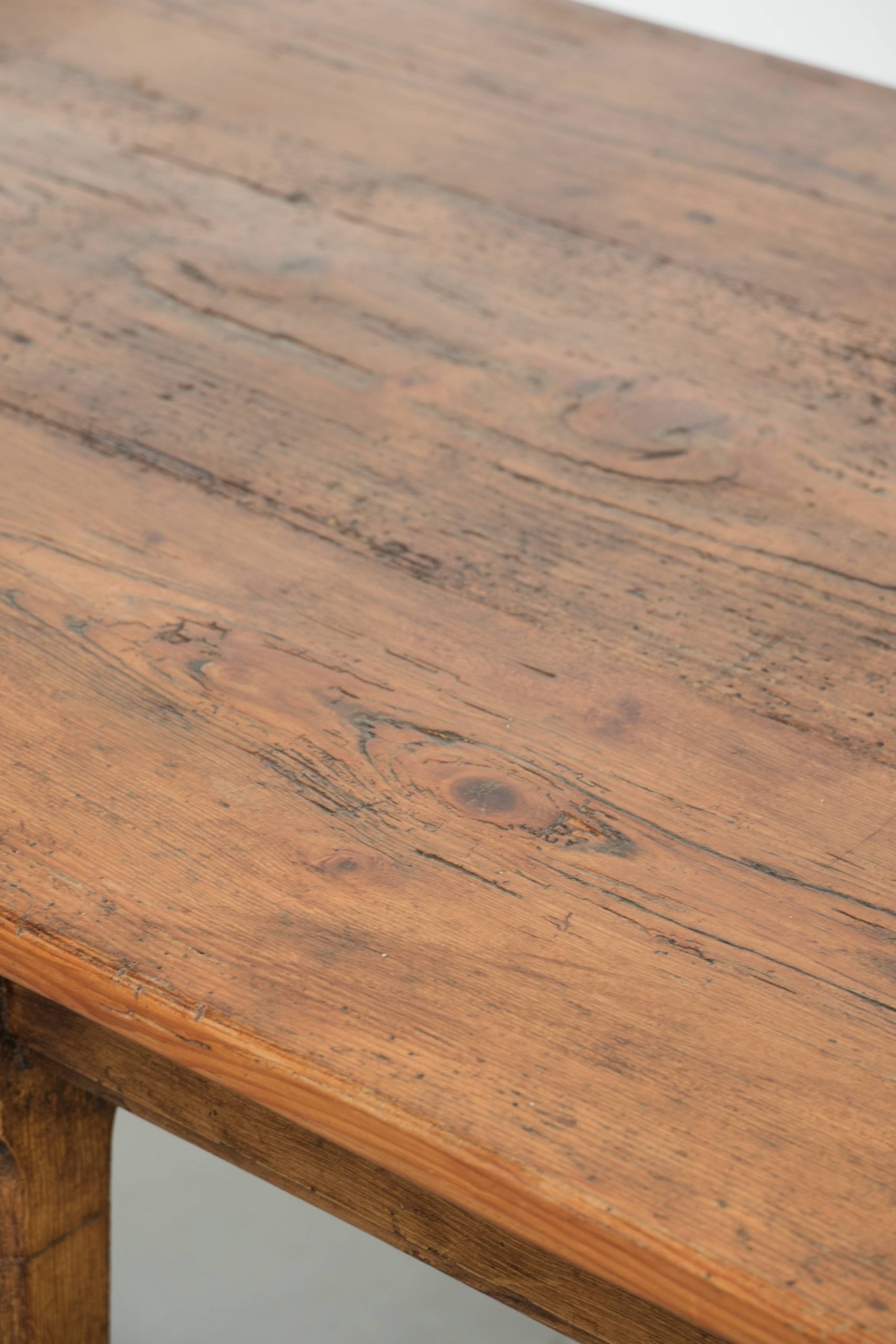Antique French farmhouse dining table of pine wood from the 19th century