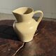 Small beige stoneware jug H14 L15