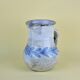 Pichet Albert Thiry with stylised blue leaves.