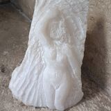 Bust of a woman in a block of alabaster