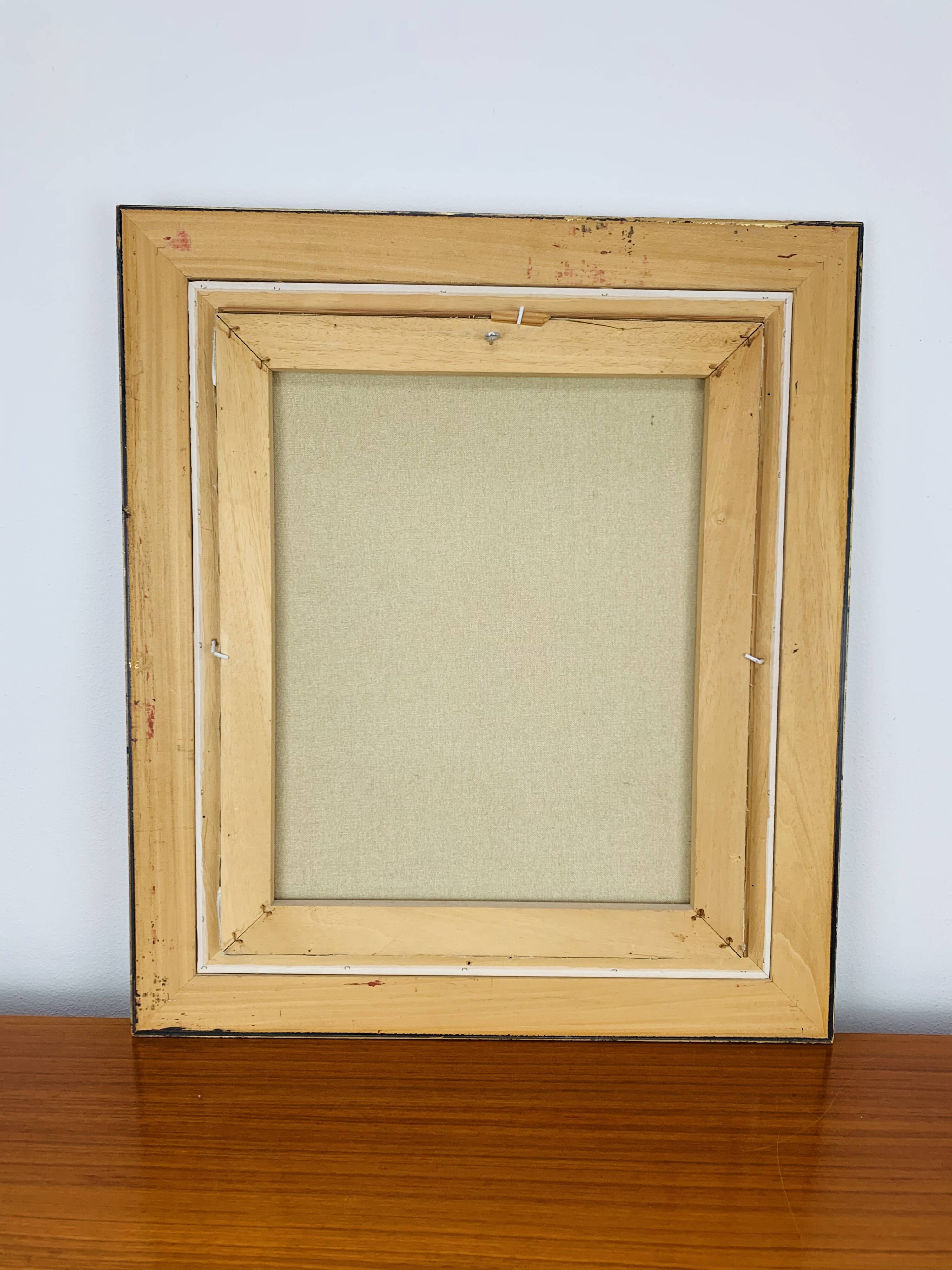 Still life painting of a bouquet of flowers, golden frame