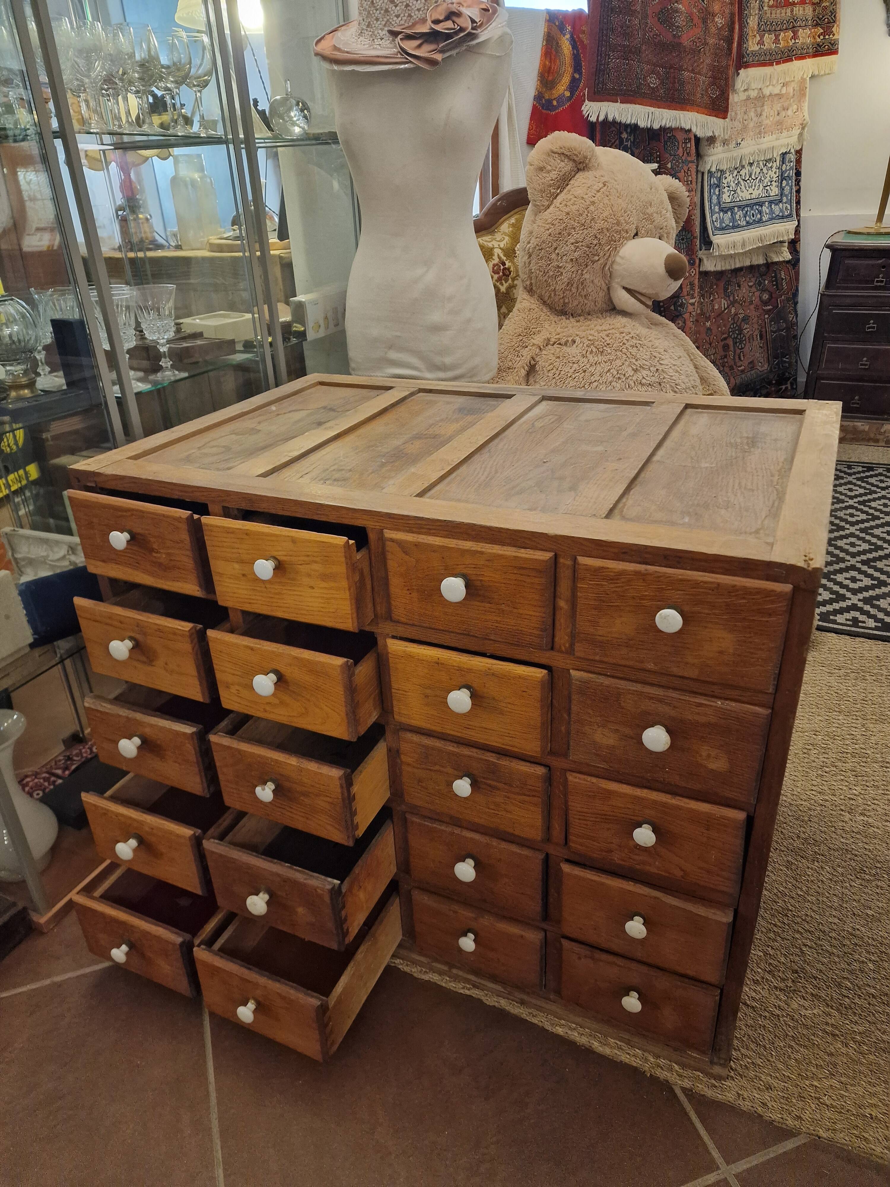 Antique craft cabinet with solid oak drawers and porcelain handles