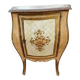 Table de chevet galbée en bois doré