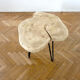 Coffee table in raw wood marbled appearance