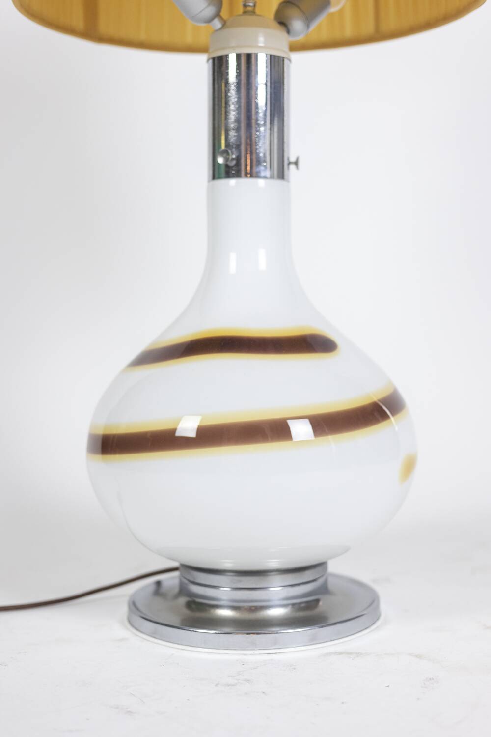 White glass lamp decorated with a brown and yellow spiral, 1970s