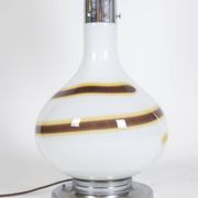 White glass lamp decorated with a brown and yellow spiral, 1970s