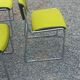 Set of 6 designer chairs with wooden seats and backs, chrome legs.