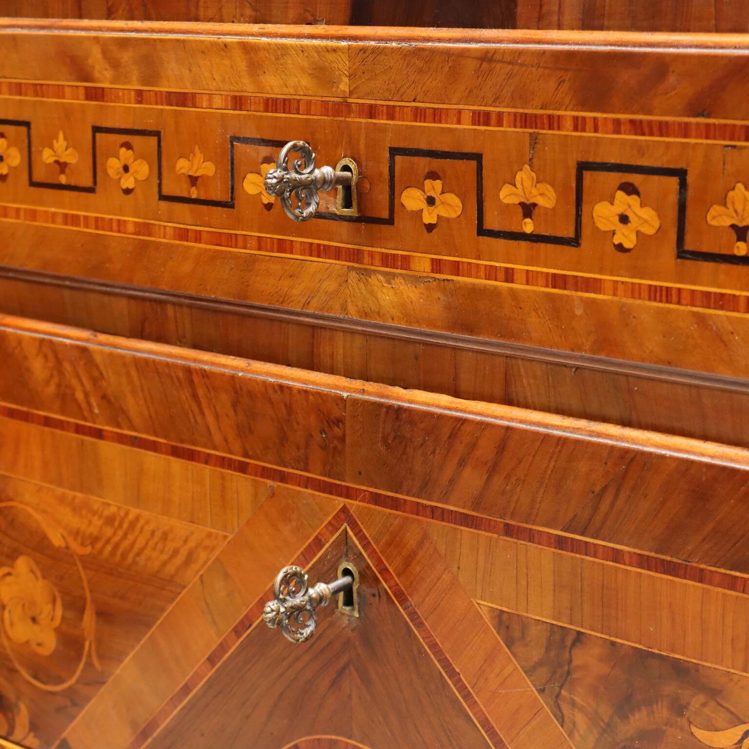 Pair of antique neoclassical walnut commodes from the 18th century.