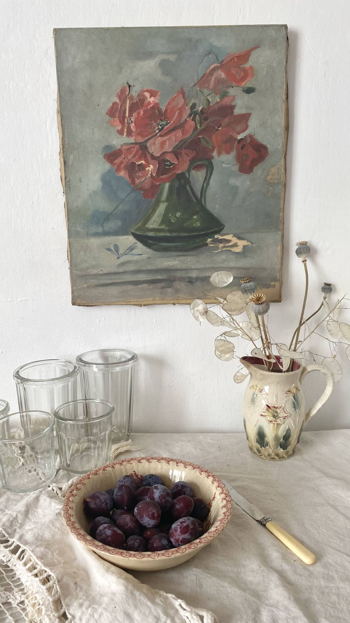 Old painting of a bouquet of poppies, canvas on a flower frame