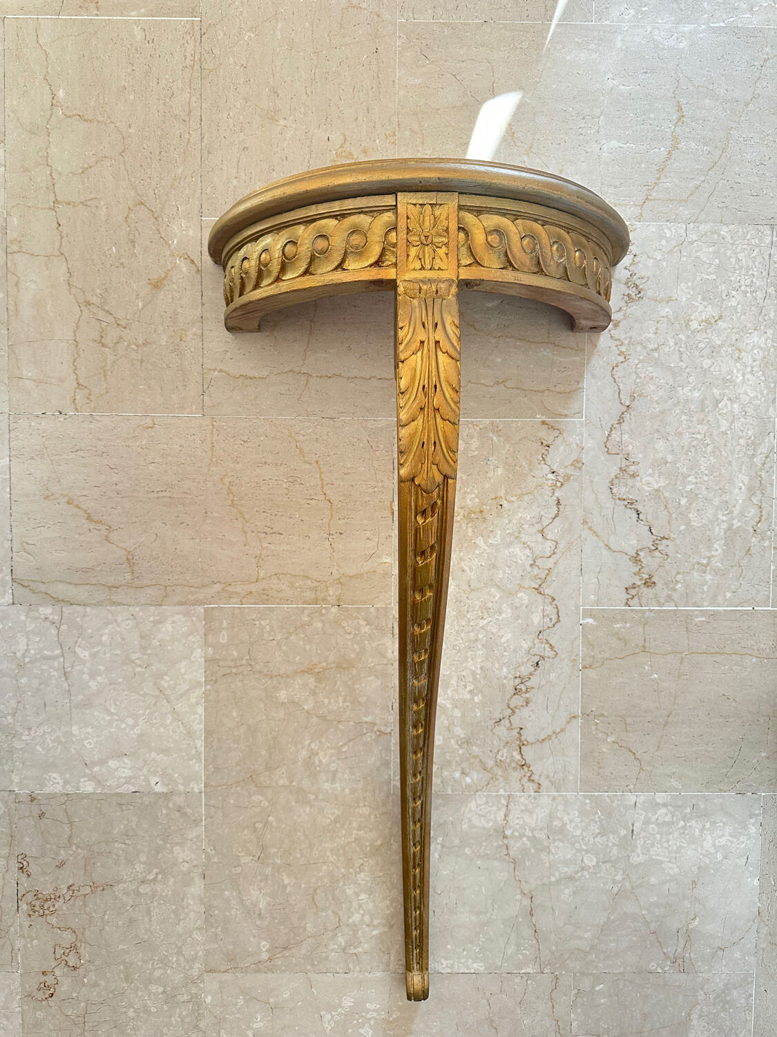 Antique gilded wall console