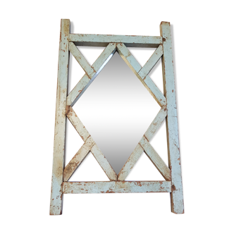 Old mirror claustras in Burmese teak