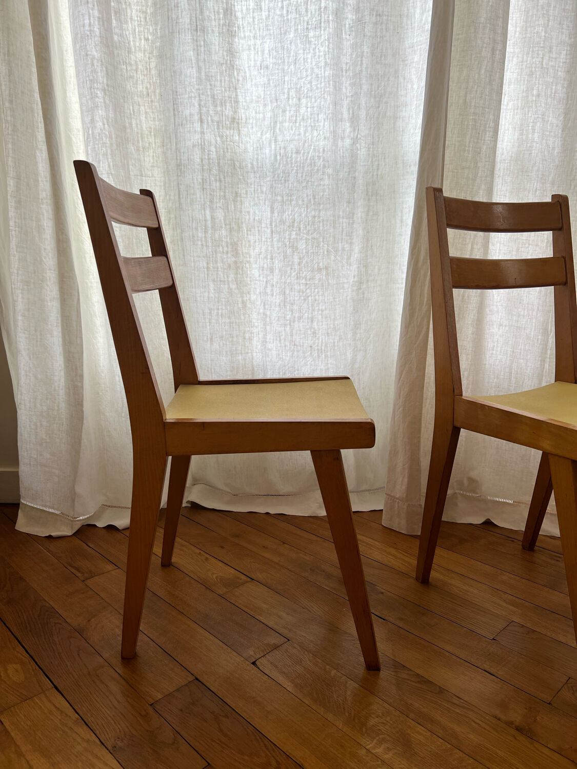 Vintage chairs in wood and skai legs from the 1950s