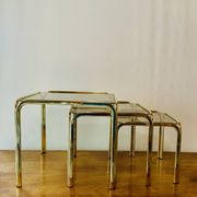 Vintage nesting tables in gold metal and smoked glass