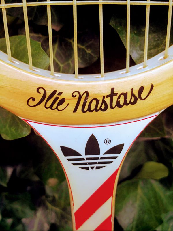 Pair of vintage Adidas Ilie Nastase & Junior tennis rackets
