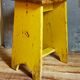 Art-populaire workshop stool in patinated wood