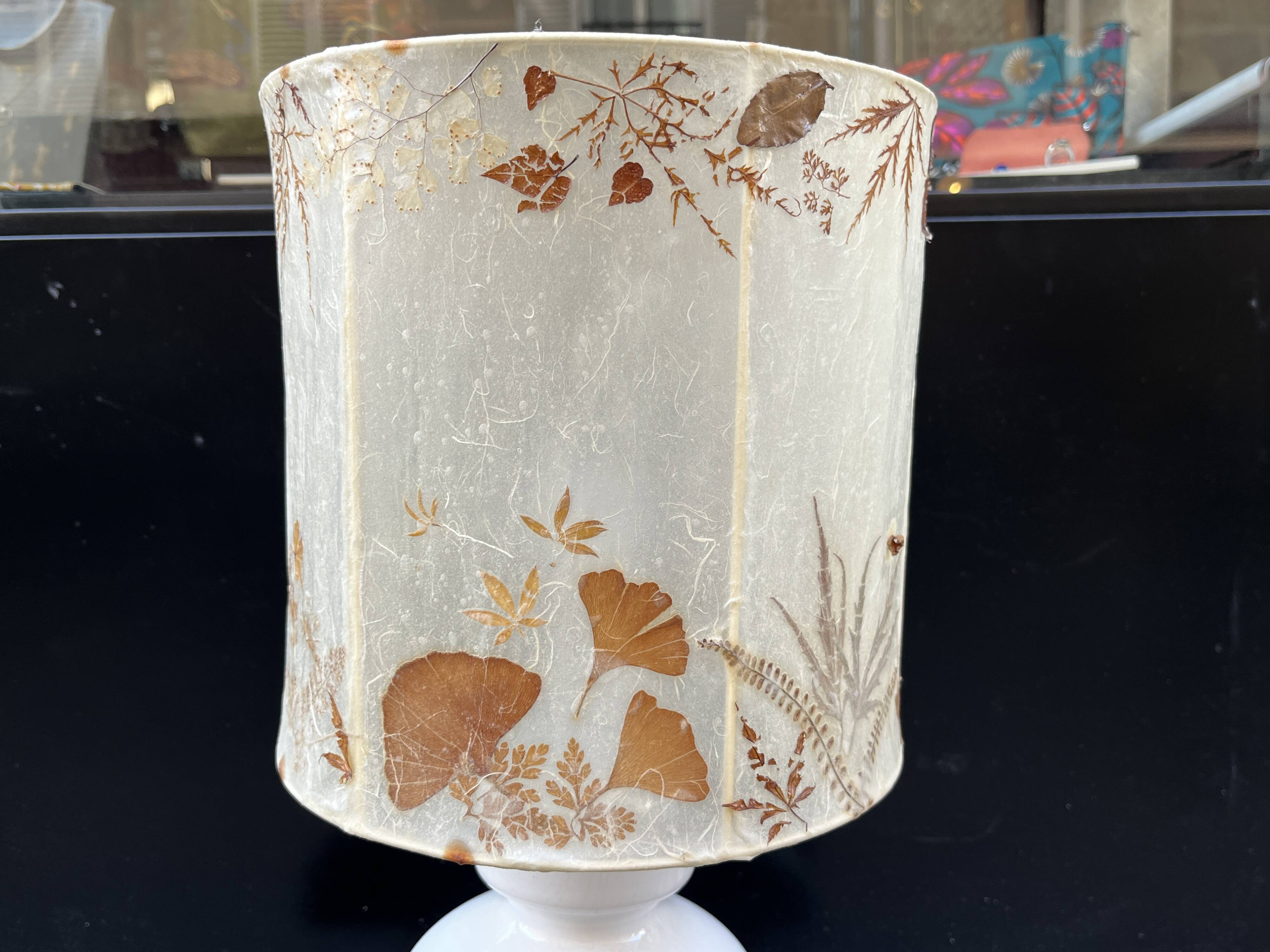 Vintage design lamp base in white ceramic with dried flower shade
