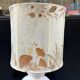 Vintage design lamp base in white ceramic with dried flower shade