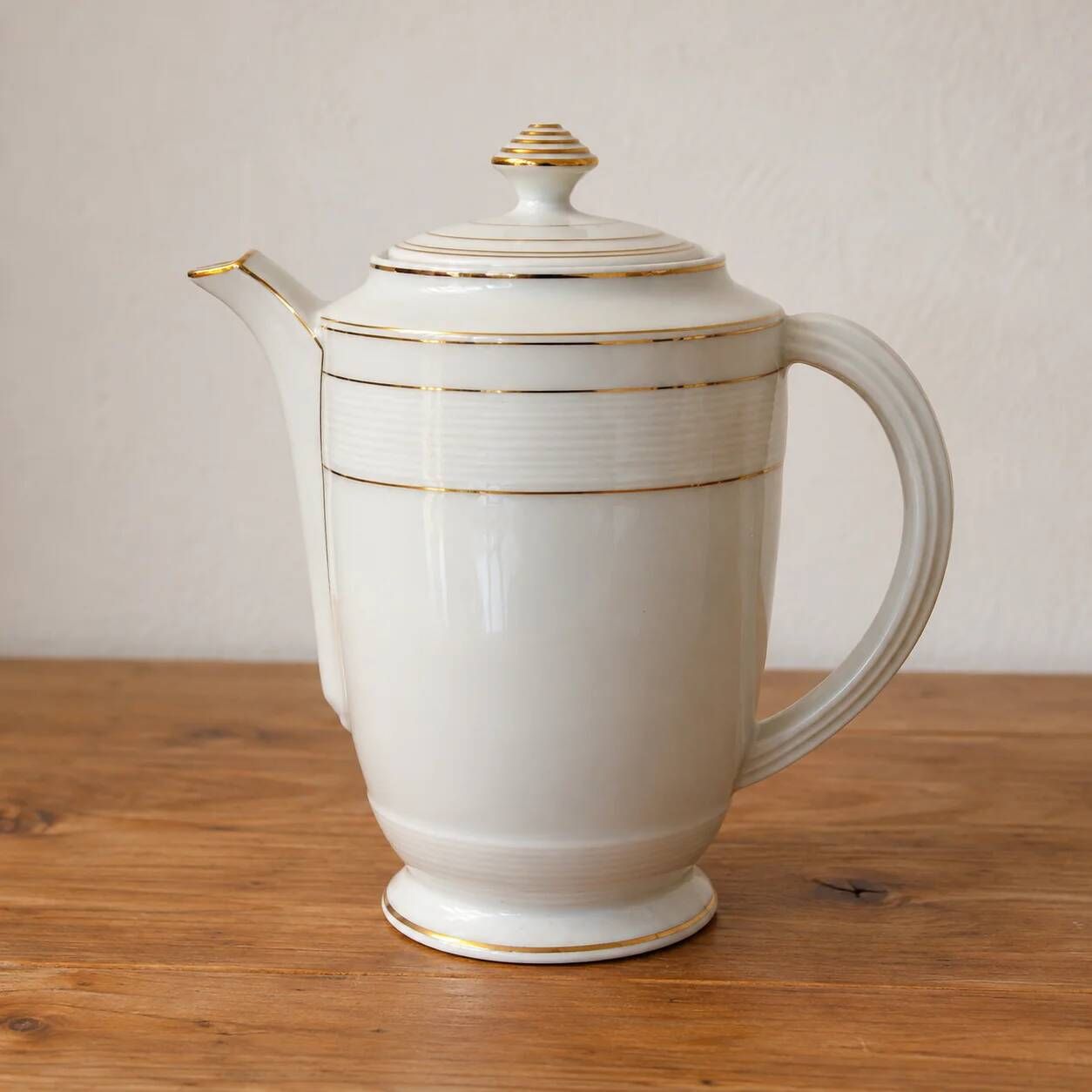 Vintage Art Deco coffee pot in Limoges porcelain by Charles Ahrenfeldt – gold trim.