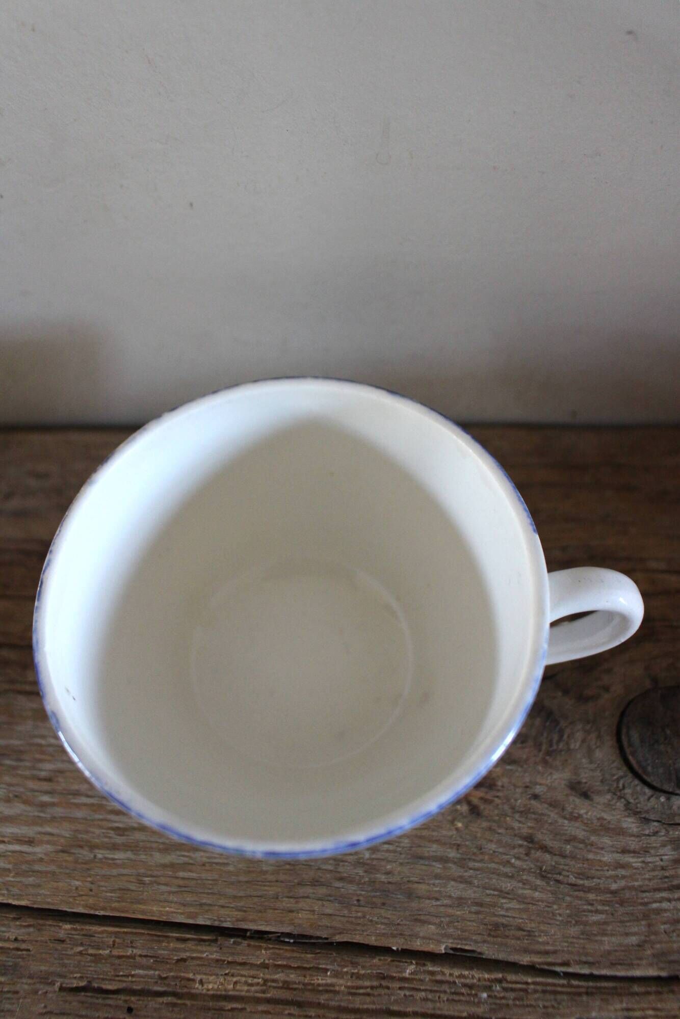 A set of two Digoin Sarreguemines Marylou Rose Art Deco cups.