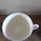A set of two Digoin Sarreguemines Marylou Rose Art Deco cups.
