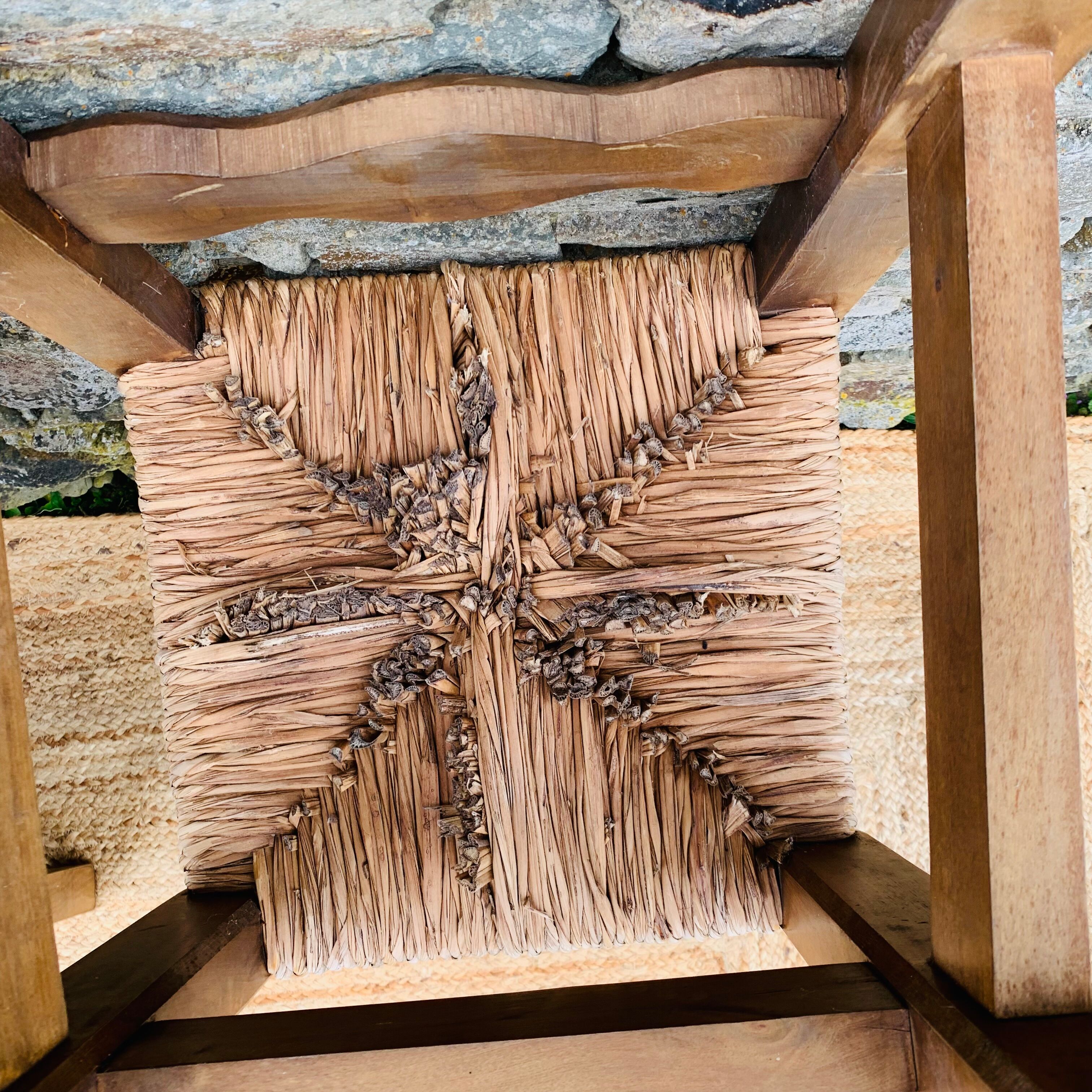 Pair of wooden and straw chairs