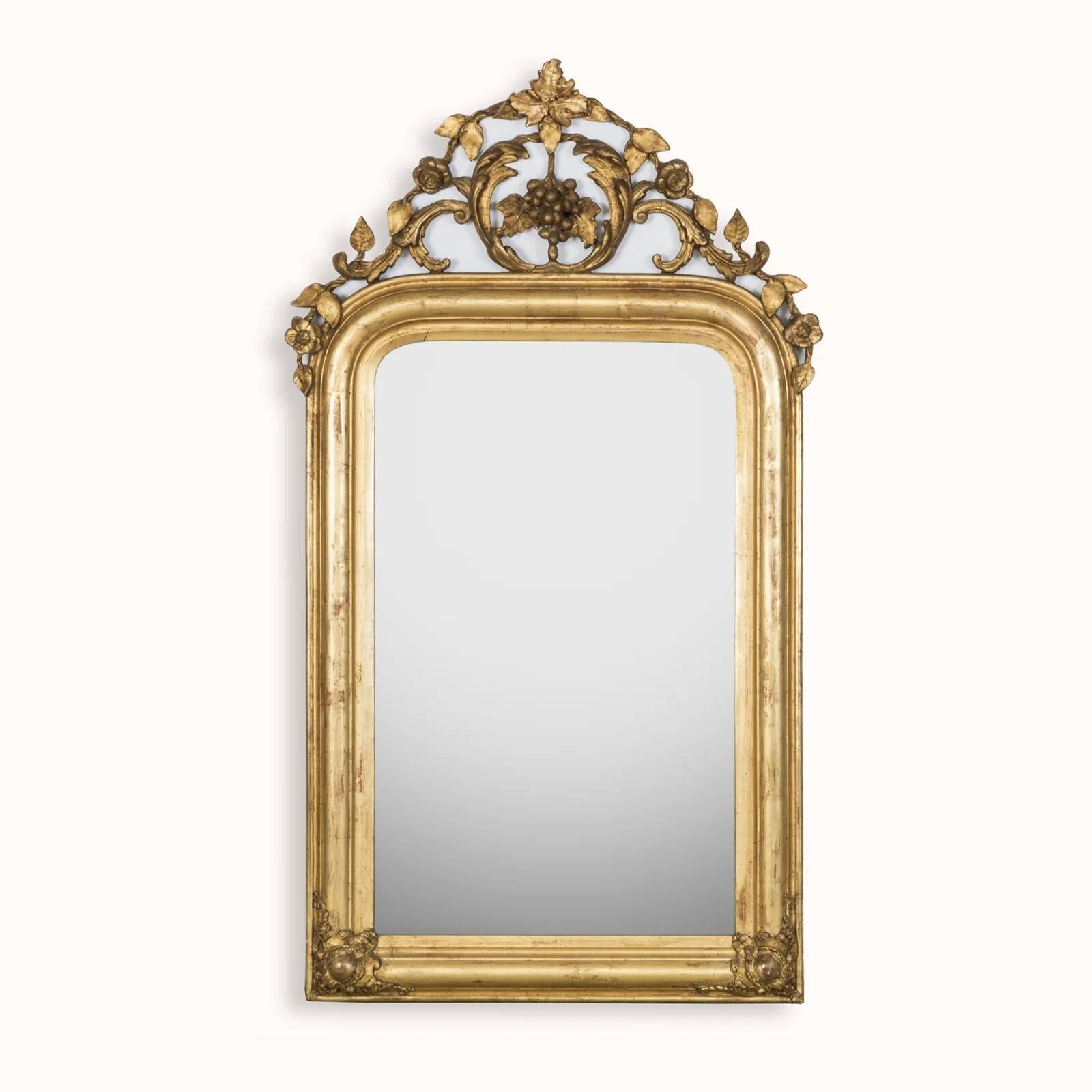 Louis-Philippe mirror from the 19th century with foliage and grape cluster motifs.