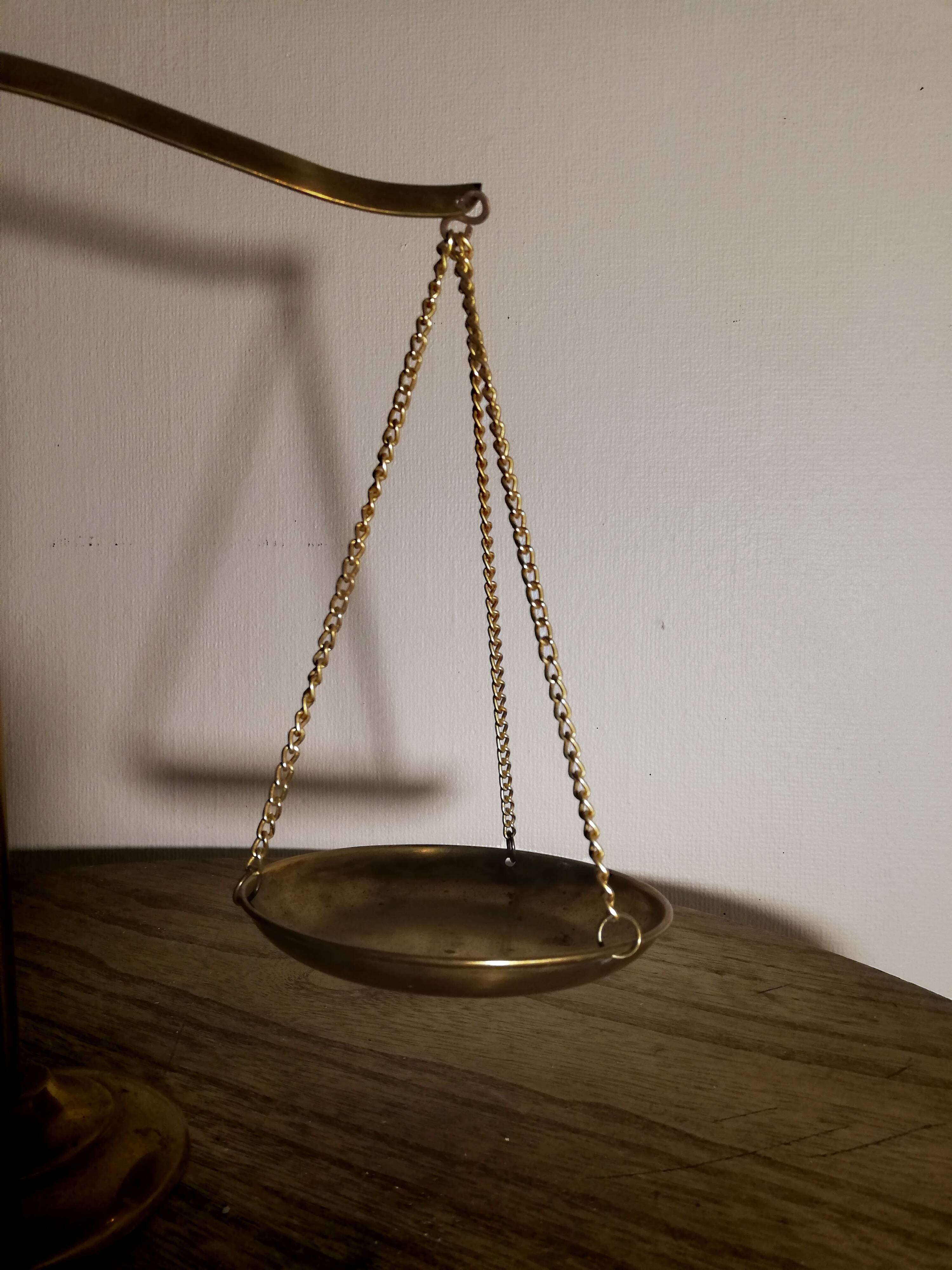 Gold metal trebuchet scale