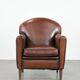 Armchair made of sheepskin leather in art deco design with warm colours
