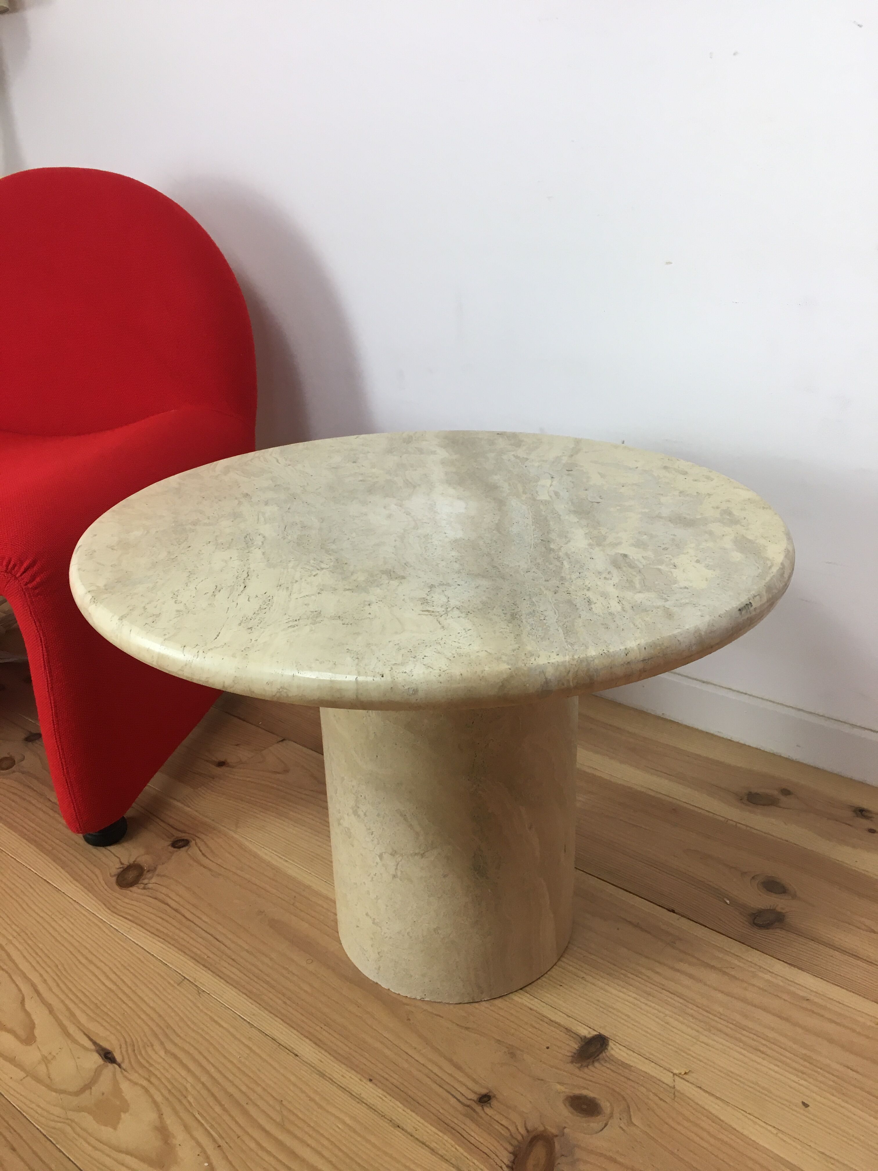 Round travertine coffee table