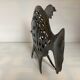 Large metal fish-shaped candle holder