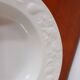 Set of 6 white ceramic deep plates made in Italy.
