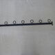 Wall-mounted wrought iron coat racks.